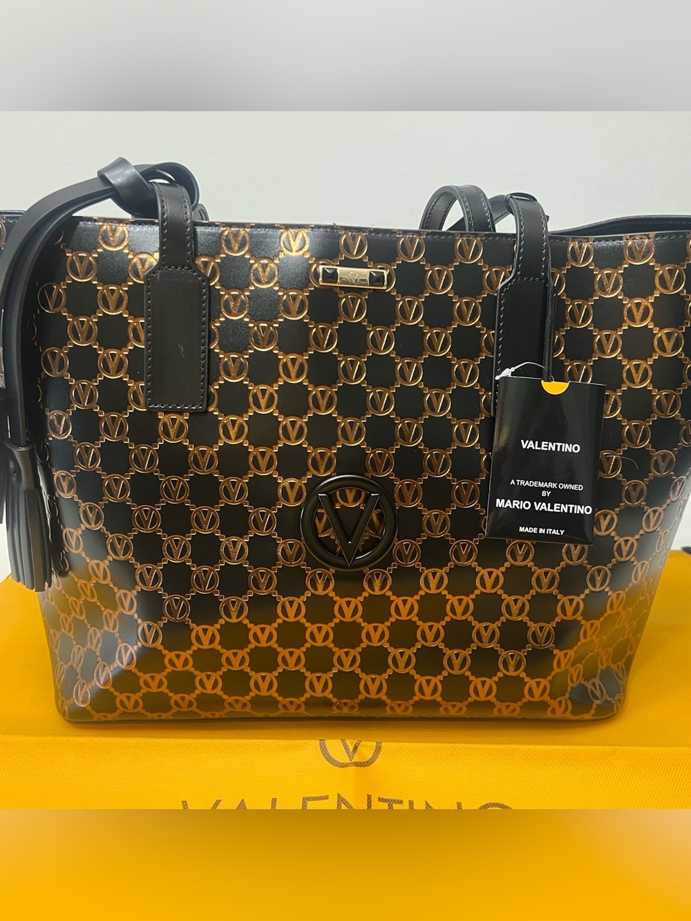 VALENTINO BY MARIO VALENTINO, PRINCE SIGNATURE MONOGRAM BLACK AND GOLD TOTE!